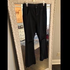 Black distressed flare jeans
